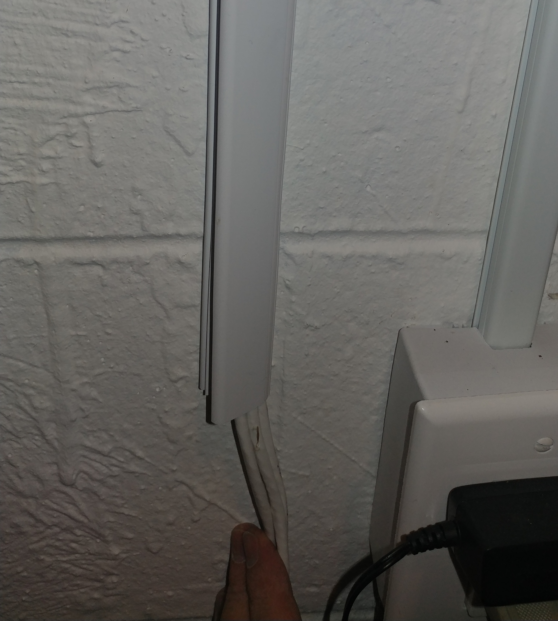 snap raceway cover in place to conceal cable