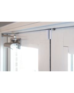 Door sensor installed on a commercial door